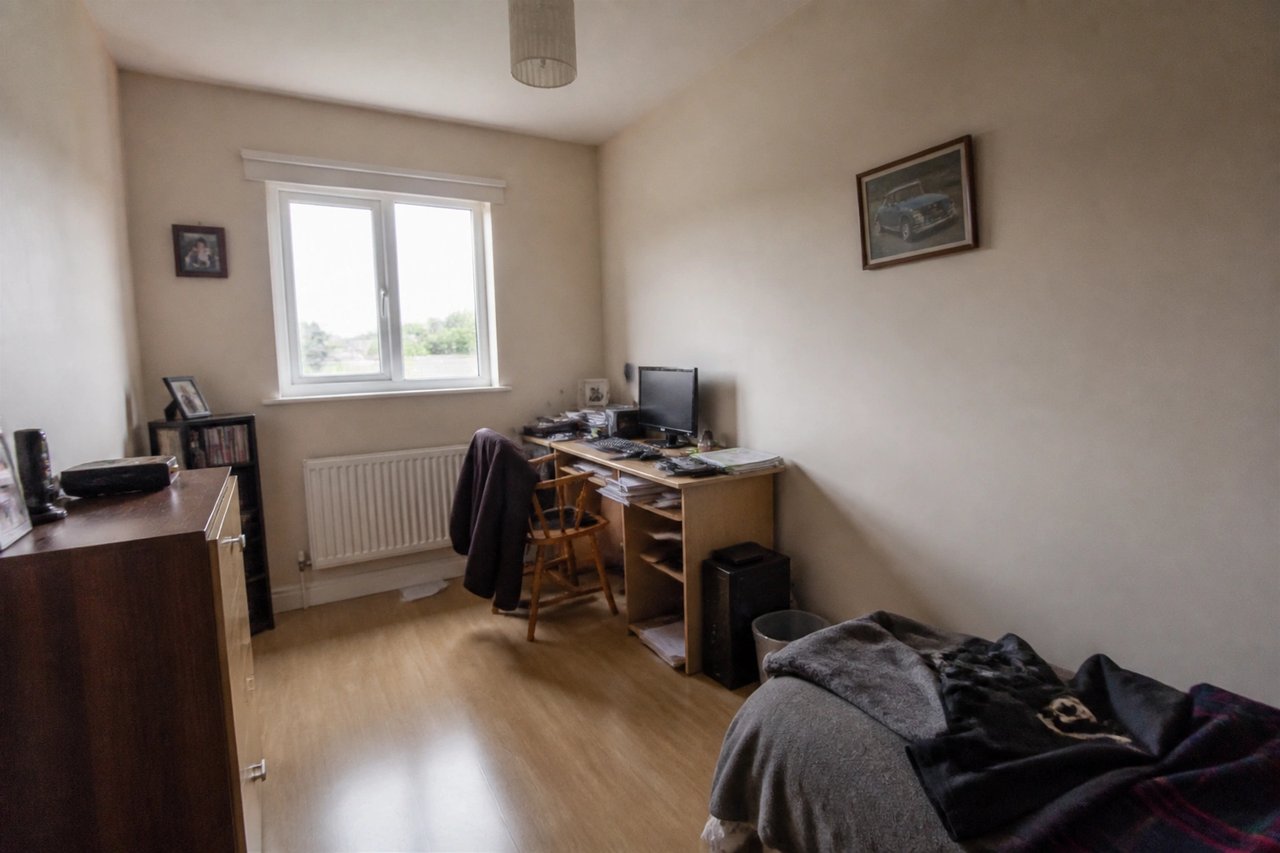 Plain spare room before AI gaming room redesign