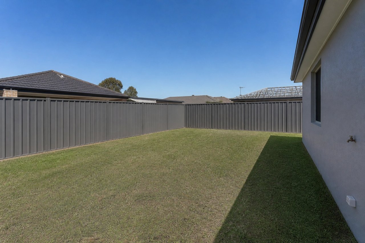 Plain bare backyard before AI garden design