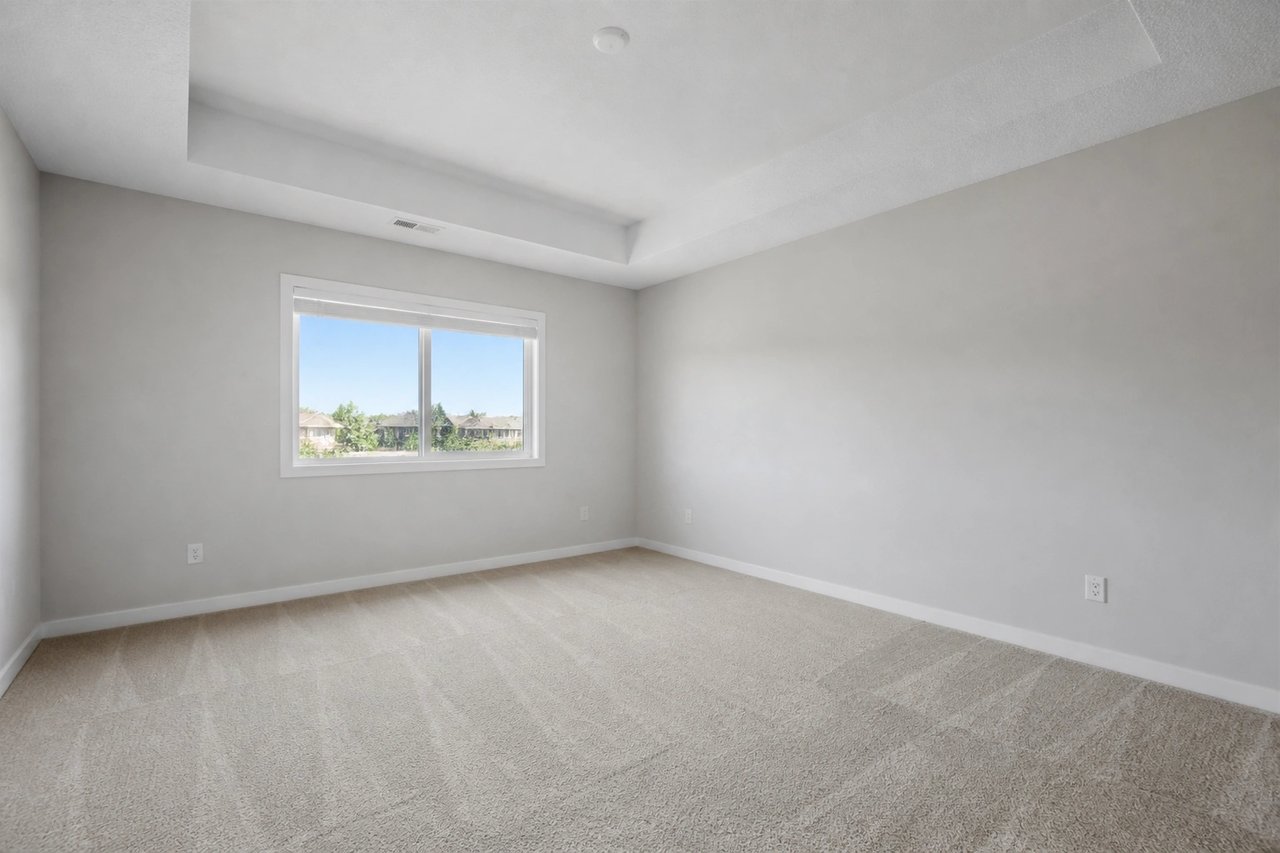 Empty master bedroom listing photo before AI virtual staging
