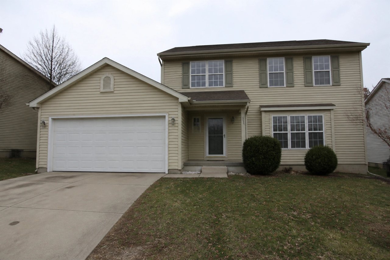 Plain suburban house exterior before AI redesign