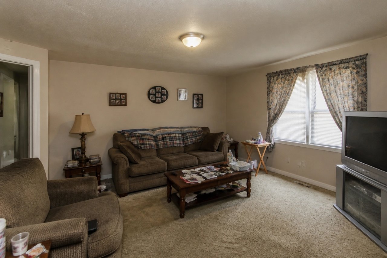 Dated living room before AI remodel