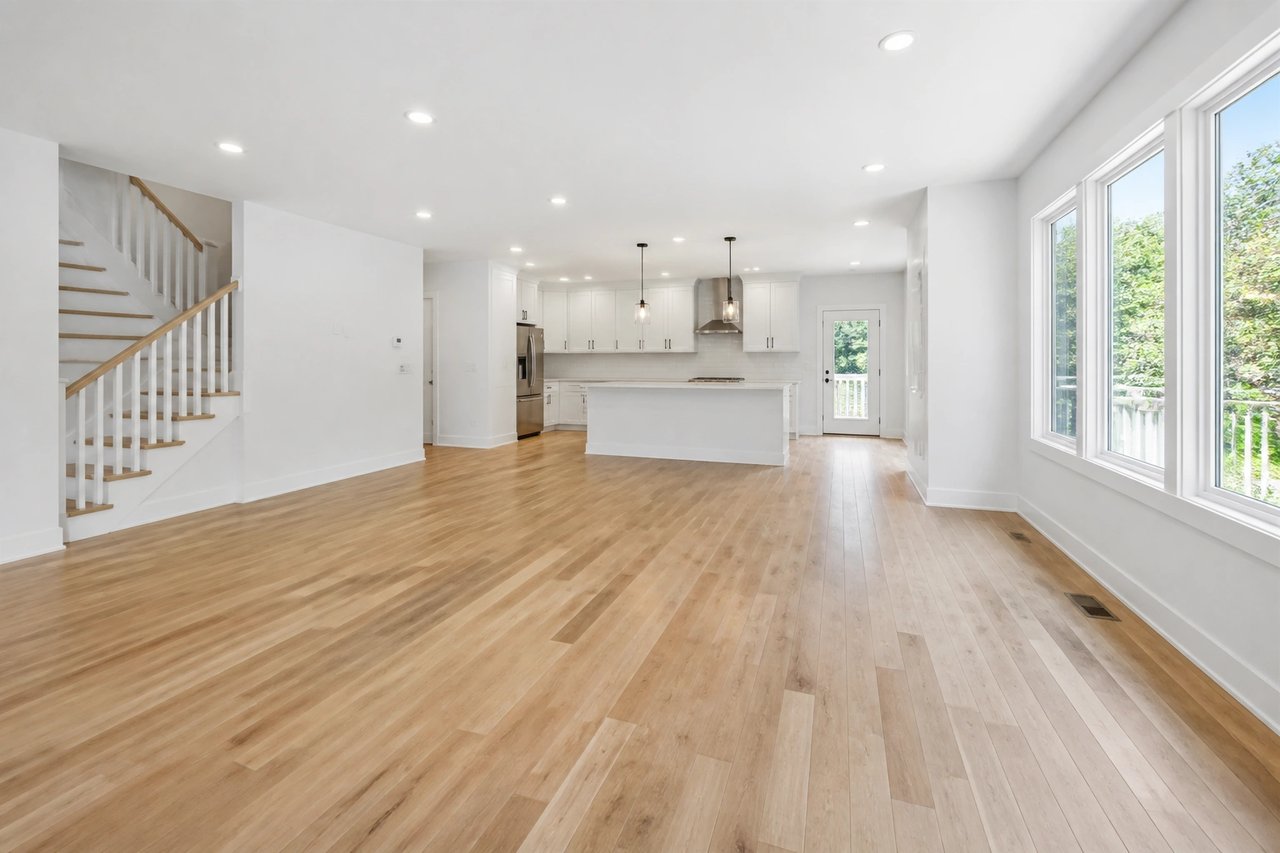 Empty open-plan listing before AI virtual staging