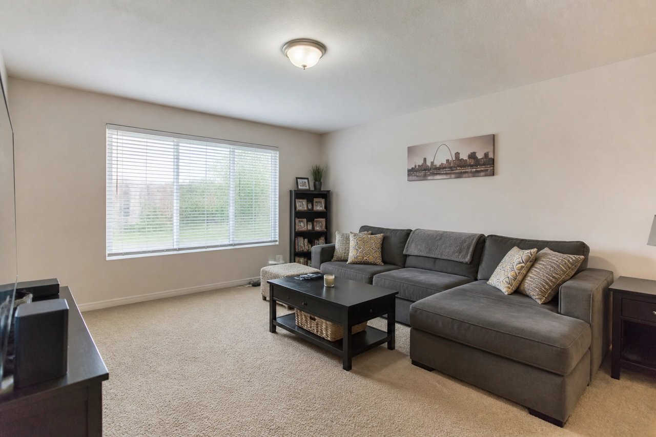 Plain white room walls before AI redesign