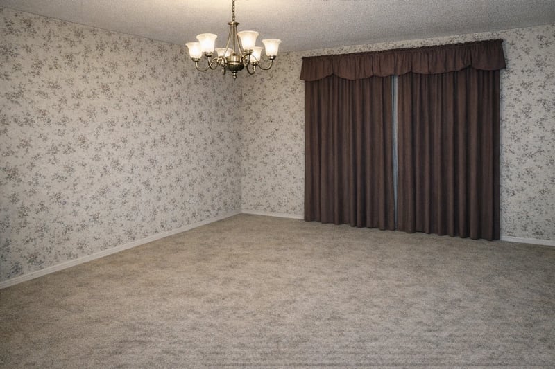 Remove all the furniture and clutter from the room